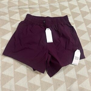 Universal standard sunny swim shorts in purple
